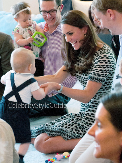 Kate Middleton in black and white print knit dress and black pumps with  Prince George in Wellington on April 8 - Celebrity Style Guide