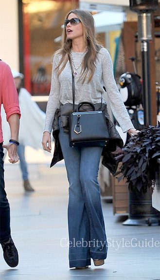 Sofia Vergara puts on a folksy chic look in double denim and sky