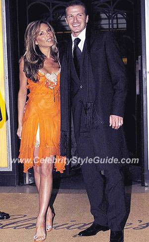 Victoria Beckham wearing Dolce & Gabbana Bright Orange Dress - Celebrity  Style Guide