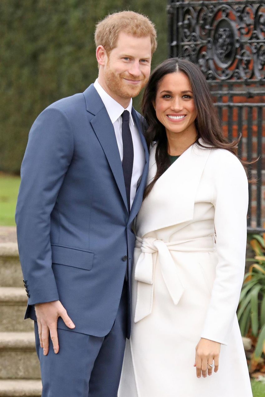 Meghan-Markle-wore-a-Line-The-Label-belted-white-coat-to-her-engagement-photocall-with-Prince-Harry